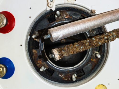 Close Up of New and Used Anode Rod for Water Heater